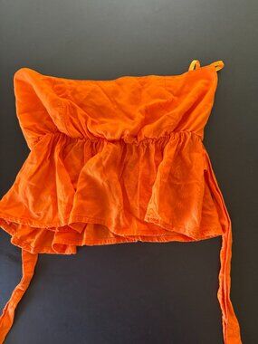 Valija XS Orange Strapless Smocked Peplum Tie Waist Top